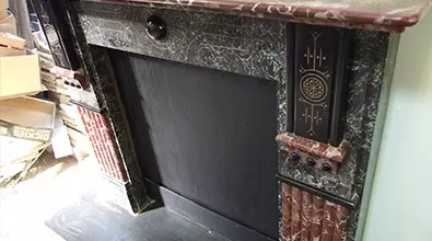 view of granite fireplace