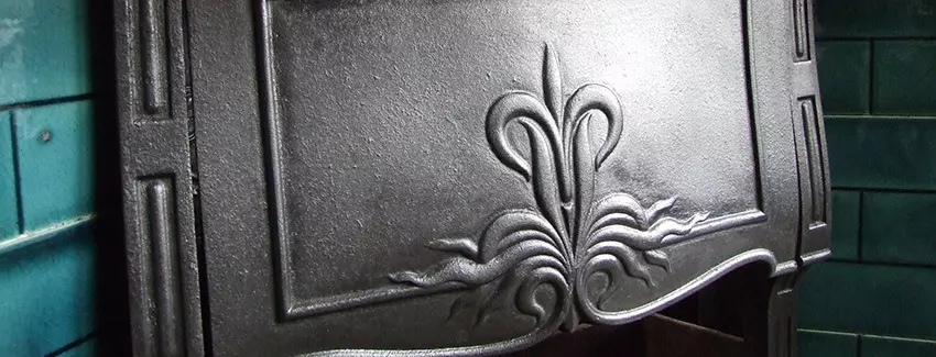 detail of restored cast iron fireplace